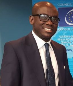 Hon. Godfred Dame